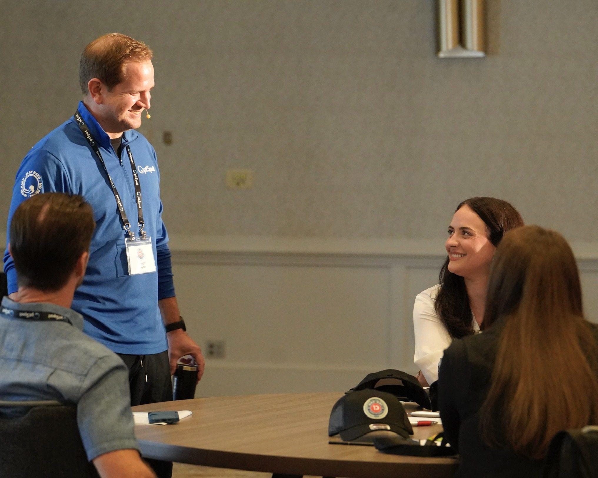 OptSpot team connecting with operators at the summit